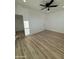 Bright, spacious bedroom with wood-look floors and ample closet space at 3627 W Palmaire Ave, Phoenix, AZ 85051