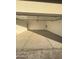 Spacious three-car garage with concrete flooring and ample storage at 3627 W Palmaire Ave, Phoenix, AZ 85051