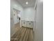 Hallway with white walls leading to a beverage center at 3627 W Palmaire Ave, Phoenix, AZ 85051