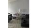 This stylish living room features a modern bar cart, comfortable seating, and decor at 3646 N 67Th Ave # 64, Phoenix, AZ 85033