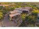 An aerial view of a spacious home with well-maintained landscaping and a private driveway at 40858 N 109Th Pl, Scottsdale, AZ 85262