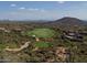 Expansive view of the pristine golf course and mountain views at 40858 N 109Th Pl, Scottsdale, AZ 85262