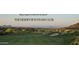 Scenic view of The Desert Mountain Club's lush green golf course surrounded by mountains at 40858 N 109Th Pl, Scottsdale, AZ 85262