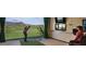 Indoor golf simulator offers a realistic golfing experience in a climate-controlled environment at 40858 N 109Th Pl, Scottsdale, AZ 85262