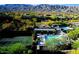 Resort-style pool and lounging area with gorgeous mountain views at this community in Scottsdale, Arizona at 40858 N 109Th Pl, Scottsdale, AZ 85262