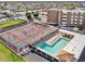 Aerial view of the community featuring a pool, pickle ball courts, and lounge area at 425 S Parkcrest -- # 323, Mesa, AZ 85206