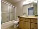 Bathroom with shower and tub, vanity, toilet and neutral tile floors at 425 S Parkcrest -- # 323, Mesa, AZ 85206