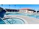 Enjoy this spacious community pool area featuring multiple pools, spas and ample seating for relaxing in the sun at 425 S Parkcrest -- # 323, Mesa, AZ 85206