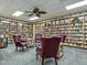 View of the community library, featuring many bookshelves, ample lighting and leather seating at 425 S Parkcrest -- # 323, Mesa, AZ 85206