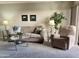 Cozy living room featuring comfortable seating and natural light, perfect for relaxing at 425 S Parkcrest -- # 323, Mesa, AZ 85206