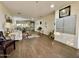 View of the spacious and well-lit lobby, featuring wood floors and comfortable seating area at 425 S Parkcrest -- # 323, Mesa, AZ 85206