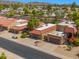 An aerial view of the community, showcasing the house nestled among lush greenery and mature trees at 4346 E Bannock St, Phoenix, AZ 85044