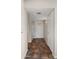 View of the entryway with tile flooring and a front door with glass accents at 4346 E Bannock St, Phoenix, AZ 85044