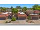 Charming home featuring a red tile roof, desert landscaping, and a two-car garage in a desirable neighborhood at 4346 E Bannock St, Phoenix, AZ 85044