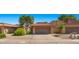 Charming home featuring a red tile roof, desert landscaping, and a two-car garage in a desirable neighborhood at 4346 E Bannock St, Phoenix, AZ 85044