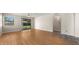 Open-concept living room with hardwood floors, and backyard view at 4346 E Bannock St, Phoenix, AZ 85044