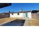 Large backyard with patio, block fence, sliding glass door, and potential for outdoor living at 5222 N 41St Ave, Phoenix, AZ 85019