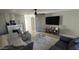 Cozy living room featuring a fireplace, modern decor, comfortable seating, and ample space at 5222 N 41St Ave, Phoenix, AZ 85019