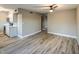 Inviting living room featuring modern flooring, neutral paint, and an open layout to the kitchen at 5222 N 41St Ave, Phoenix, AZ 85019