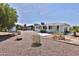 Spacious backyard with desert landscaping, offering ample space for customization at 5510 E Dallas St, Mesa, AZ 85205