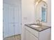 Bathroom featuring a modern vanity with quartz counters, and updated fixtures at 5510 E Dallas St, Mesa, AZ 85205