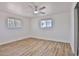 Bright bedroom featuring a ceiling fan, neutral walls, and natural light at 5510 E Dallas St, Mesa, AZ 85205