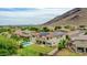 Inviting backyard featuring a pool and well-kept lawn, perfect for relaxation and outdoor gatherings at 5812 W Spur Dr, Phoenix, AZ 85083