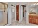 Bathroom vanity with sink, shower, and access to walk-in closet enhances the luxury feel at 5812 W Spur Dr, Phoenix, AZ 85083