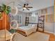 Stylish bedroom with unique decor, including pendant lighting and modern furnishings at 5812 W Spur Dr, Phoenix, AZ 85083