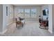 The bonus room is a relaxing retreat, with natural light, cozy seating, and entertainment options at 5812 W Spur Dr, Phoenix, AZ 85083