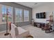 A cozy bonus room provides ample space with comfortable seating and entertainment for relaxing afternoons at 5812 W Spur Dr, Phoenix, AZ 85083