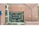 Aerial view of courtyard with outdoor seating, AC units, and a patterned stone floor at 5812 W Spur Dr, Phoenix, AZ 85083