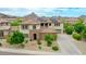 Stunning two-story home with a tile roof, solar panels, and beautiful desert landscaping at 5812 W Spur Dr, Phoenix, AZ 85083