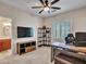 Functional office space with built-in shelving and a comfortable work area at 5812 W Spur Dr, Phoenix, AZ 85083