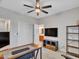 Versatile office space with neutral tones and a built-in shelving unit, perfect for working at 5812 W Spur Dr, Phoenix, AZ 85083