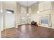 Spacious living room with tall ceilings, piano, large windows, and neutral paint colors at 6202 W Maya Dr, Phoenix, AZ 85083