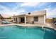 This backyard features a pool, patio, and lounge chairs, perfect for relaxing and enjoying the outdoors at 6366 W Saint John Ave, Glendale, AZ 85308