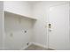 Small laundry room is ready for washer and dryer at 6366 W Saint John Ave, Glendale, AZ 85308