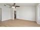 Open floor plan features a ceiling fan and easy access to the kitchen at 6366 W Saint John Ave, Glendale, AZ 85308