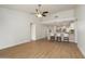 Spacious living room with vaulted ceilings, ceiling fan, and modern barstool seating at 6366 W Saint John Ave, Glendale, AZ 85308