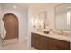 Elegant bathroom with double vanity, bronze fixtures, and tiled shower at 6529 E Eugie Ter, Scottsdale, AZ 85254