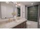 Modern bathroom featuring a double sink vanity, tiled shower, and sleek fixtures at 6529 E Eugie Ter, Scottsdale, AZ 85254