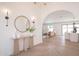 Bright entryway with herringbone floors, modern decor, and an open view into the living spaces at 6529 E Eugie Ter, Scottsdale, AZ 85254