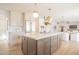 Spacious kitchen with a large island, stainless steel appliances, and an open floor plan at 6529 E Eugie Ter, Scottsdale, AZ 85254