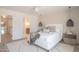 Spacious main bedroom with access to en-suite bathroom and plenty of natural light at 6529 E Eugie Ter, Scottsdale, AZ 85254