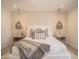 Beautifully decorated main bedroom features pendant lighting and a modern rug at 6529 E Eugie Ter, Scottsdale, AZ 85254