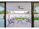 Inviting covered patio with stylish seating, ceiling fan, and seamless indoor-outdoor living at 6529 E Eugie Ter, Scottsdale, AZ 85254