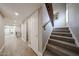 Finished basement area with tile floors, stairs, and storage at 6533 N 7Th Ave # 18, Phoenix, AZ 85013