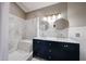 Beautiful bathroom features a double sink vanity and marble tiled shower at 6533 N 7Th Ave # 18, Phoenix, AZ 85013