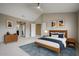 Comfortable bedroom with ensuite bathroom, neutral colors and wooden accents throughout at 6533 N 7Th Ave # 18, Phoenix, AZ 85013